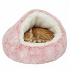 Niche pour chat rose avec chat roux